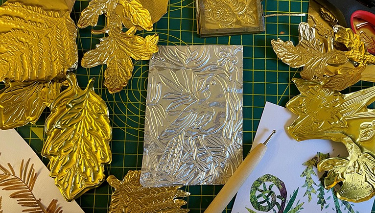 Golden cut outs of leaves 